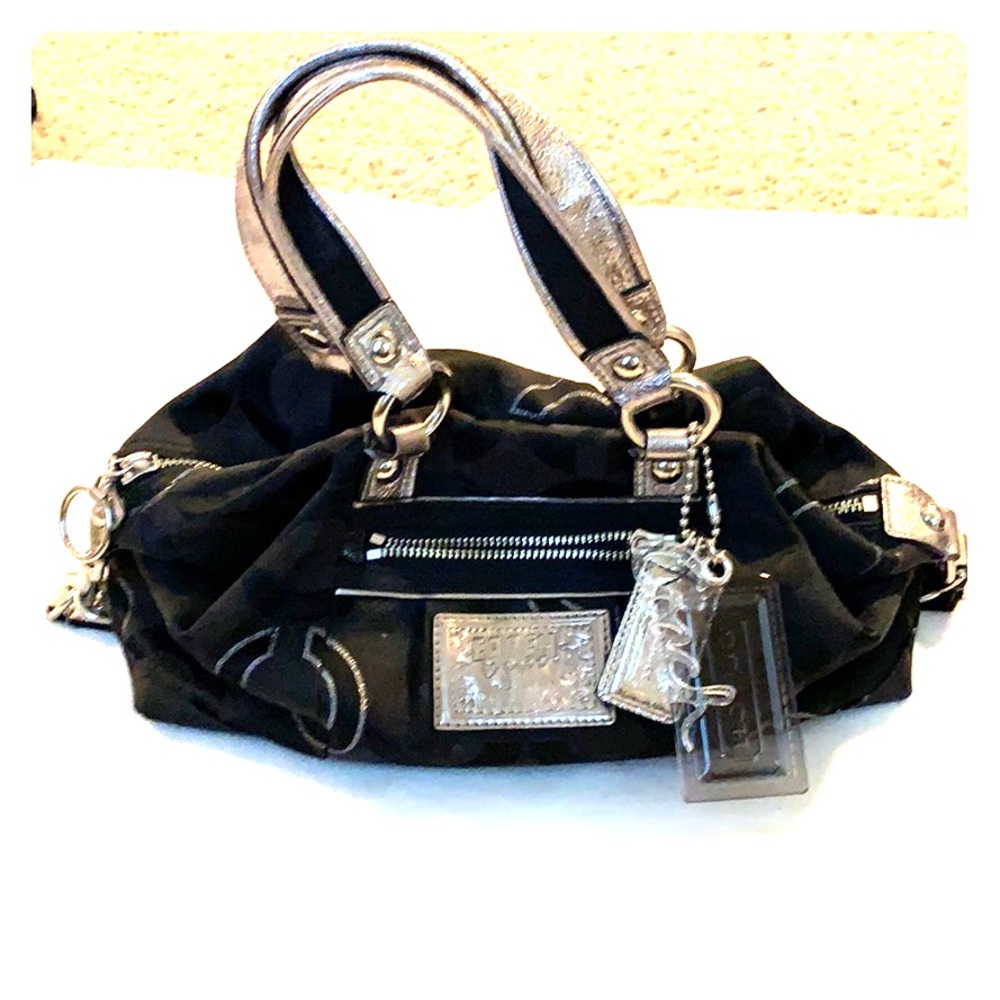 Black and silver coach purse